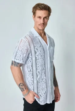 Chemise unie en dentelle manches courtes col à revers