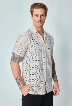 Chemise unie en dentelle manches courtes col à revers