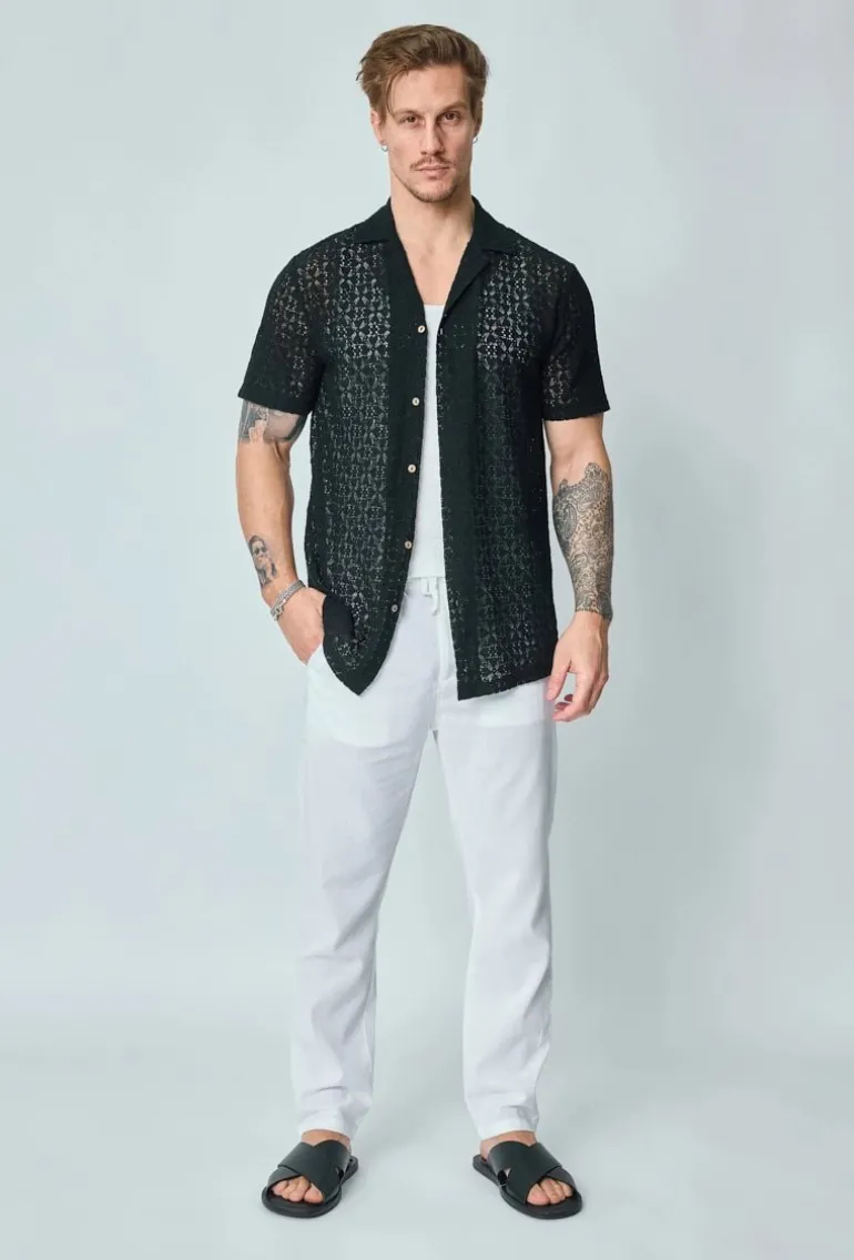 Chemise unie en dentelle manches courtes col à revers