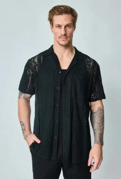 Chemise unie en dentelle manches courtes col à revers