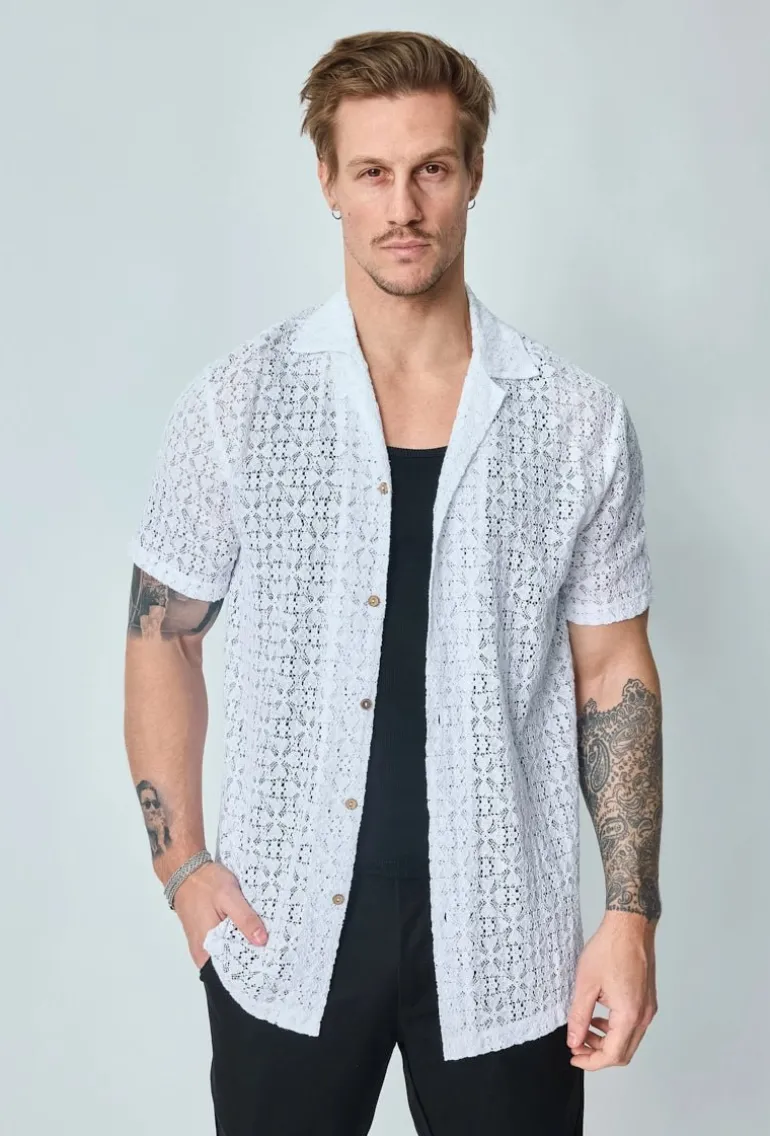 Chemise unie en dentelle manches courtes col à revers