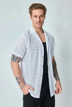 Chemise unie en dentelle manches courtes col à revers