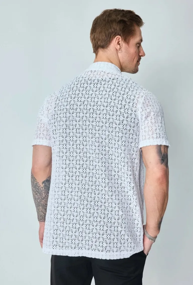 Chemise unie en dentelle manches courtes col à revers