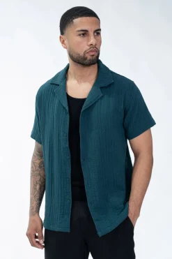 Chemise unie manches courtes