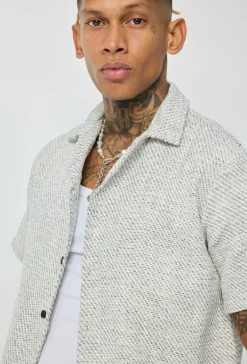 Chemise unie manches courtes