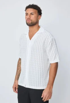 Chemise unie manches courtes à boutons