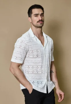 Chemise unie manches courtes à motifs