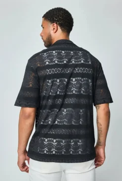 Chemise unie manches courtes à motifs