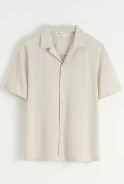 Chemise unie manches courtes