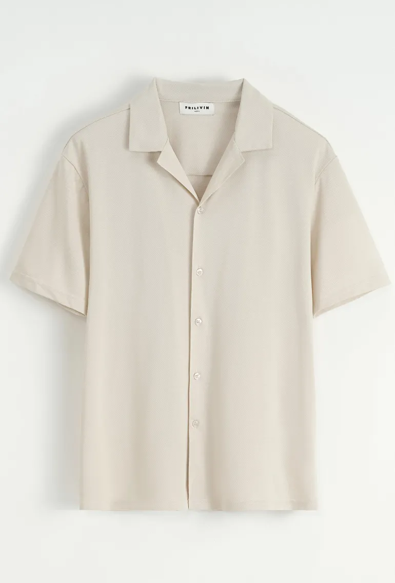 Chemise unie manches courtes