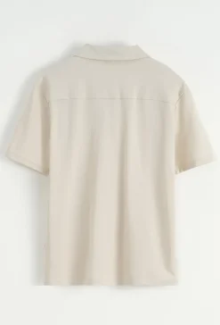 Chemise unie manches courtes