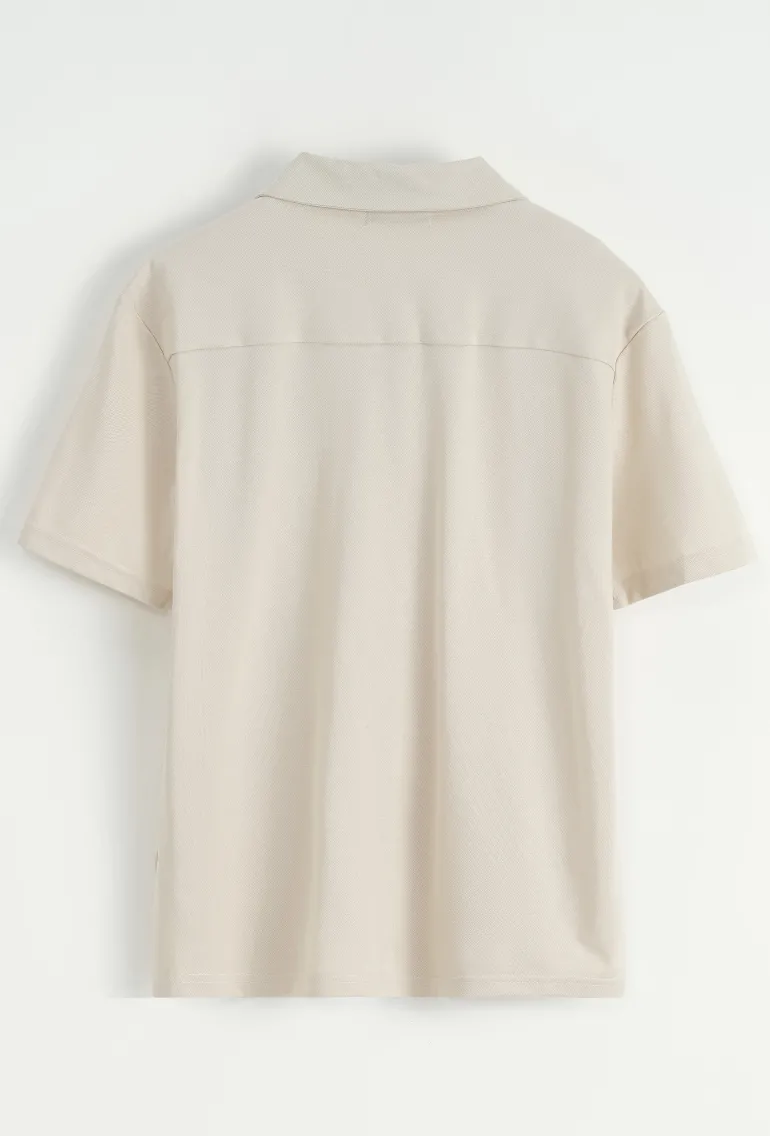 Chemise unie manches courtes