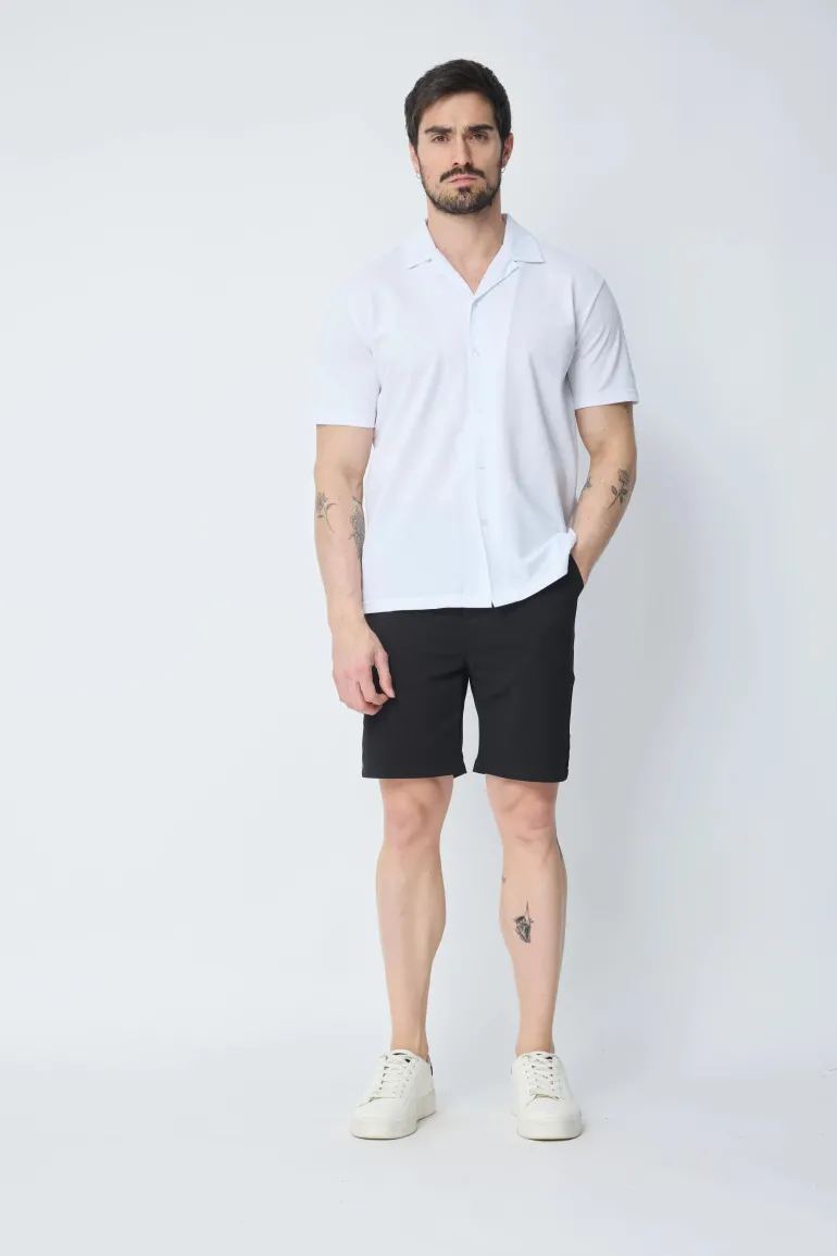 Chemise unie manches courtes