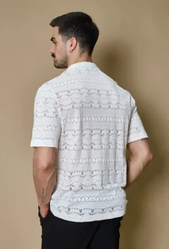 Chemise unie manches courtes à motifs