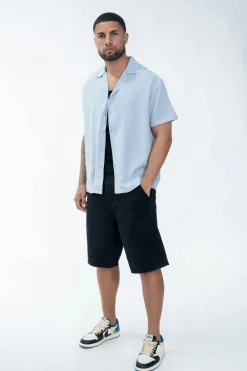 Chemise unie manches courtes