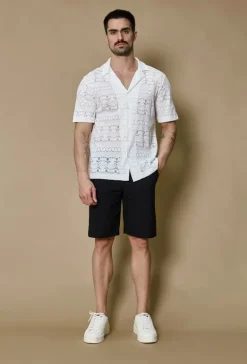 Chemise unie manches courtes à motifs