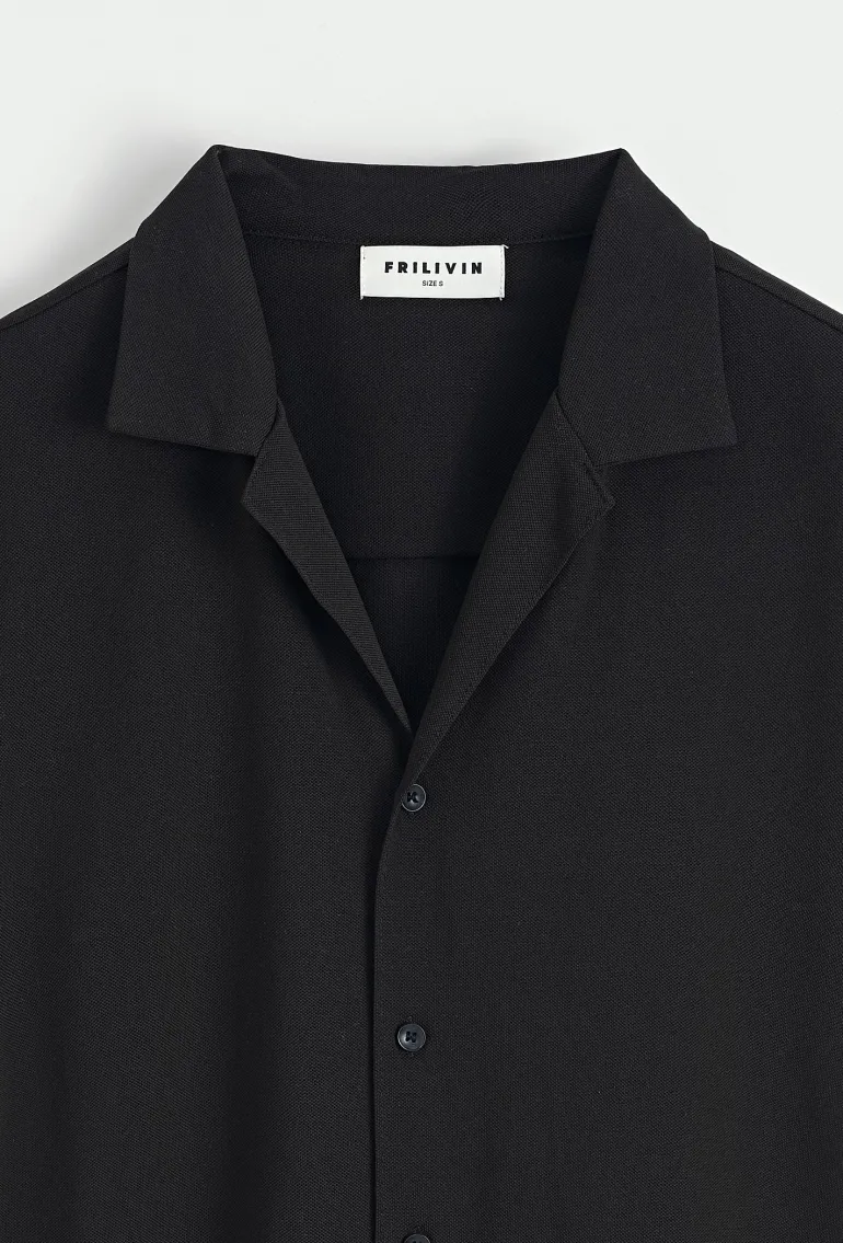 Chemise unie manches courtes