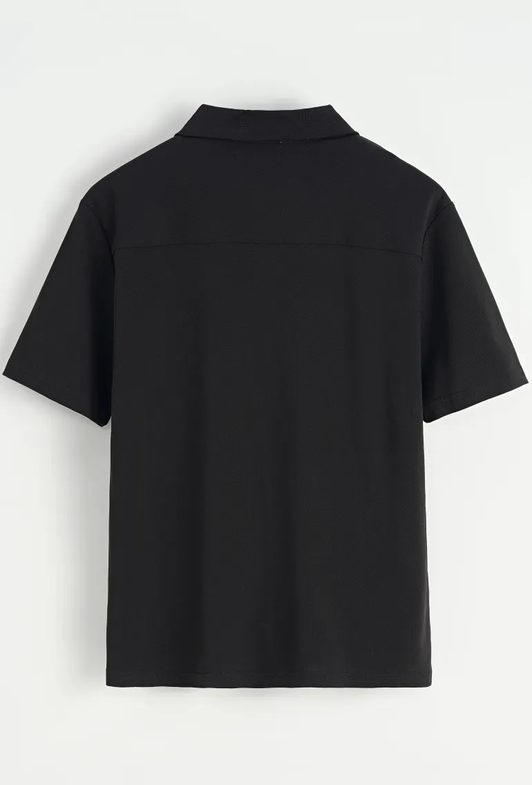 Chemise unie manches courtes