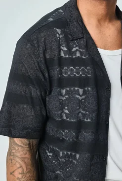 Chemise unie manches courtes à motifs