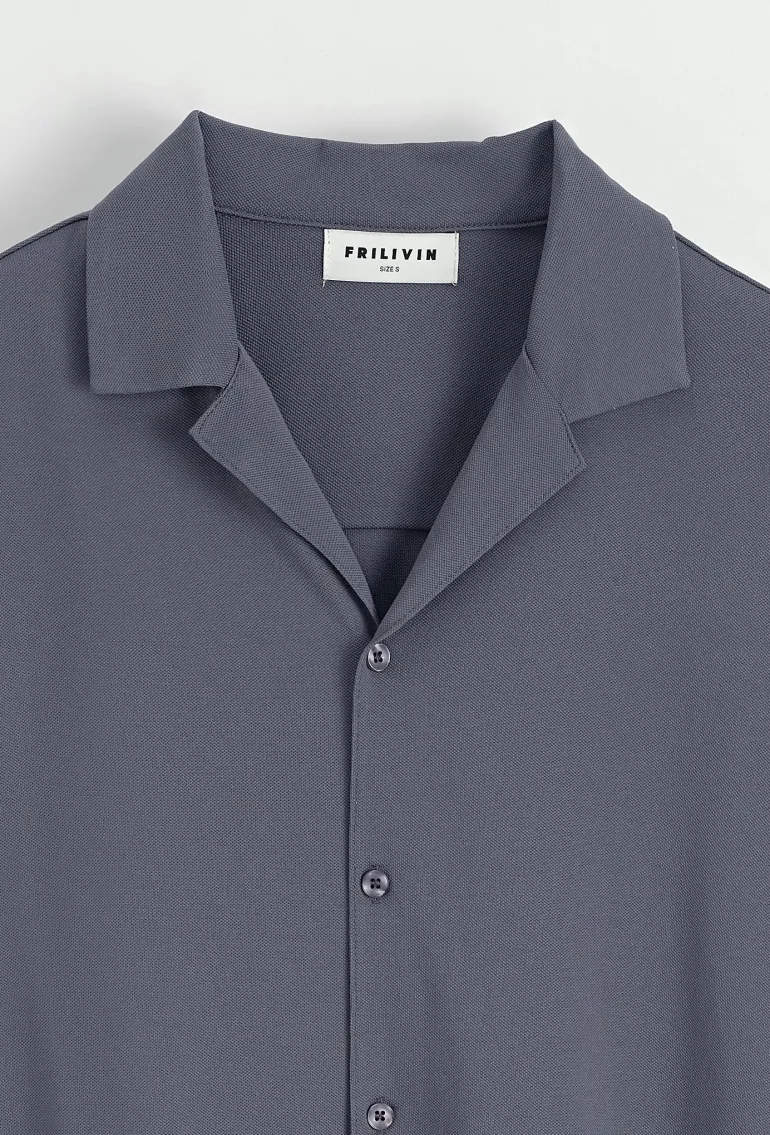 Chemise unie manches courtes