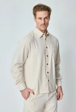 Chemise unie manches longues