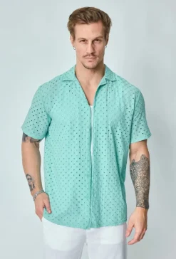 Chemise unie trouée manches courtes