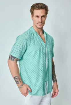 Chemise unie trouée manches courtes