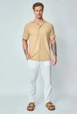 Chemise unie trouée manches courtes