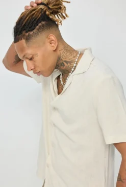 Ensemble chemise à manches courtes et pantalon uni