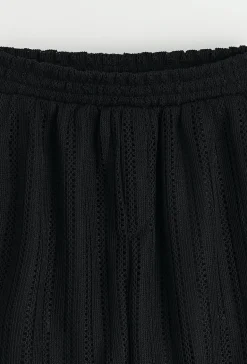 Ensemble chemise et short unis à rayures