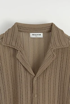 Ensemble chemise et short unis à rayures