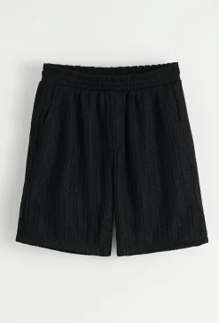 Ensemble chemise et short unis à rayures