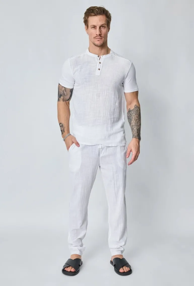 Ensemble polo pantalon uni effet lin