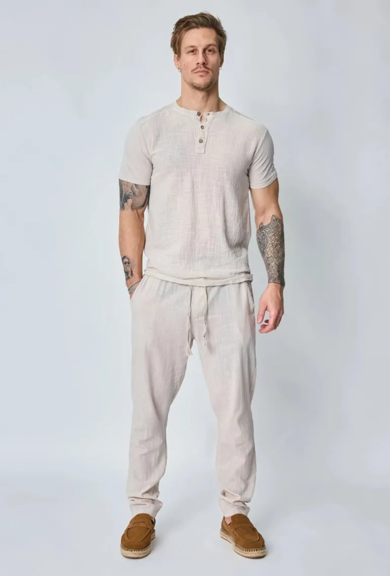 Ensemble polo pantalon uni effet lin