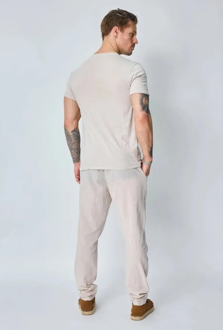 Ensemble polo pantalon uni effet lin