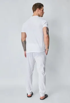 Ensemble polo pantalon uni effet lin