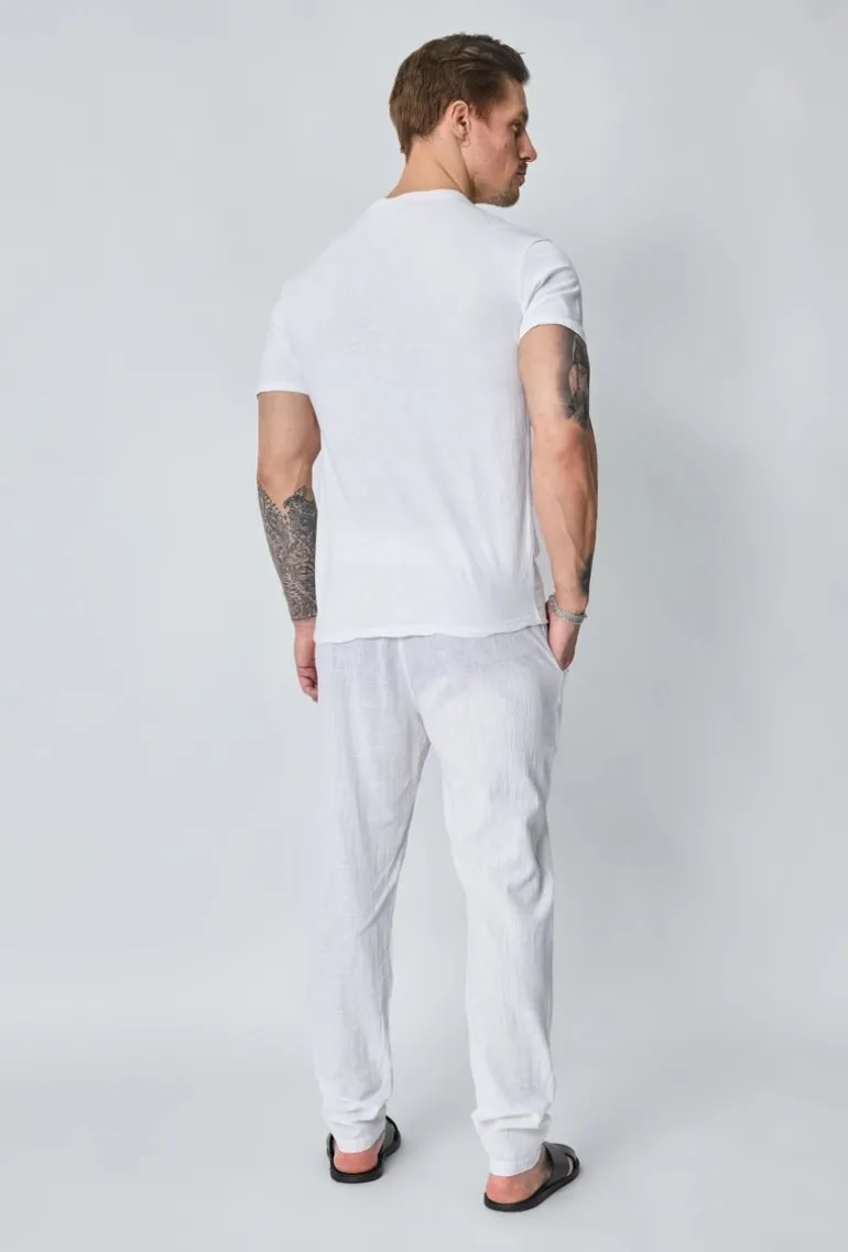 Ensemble polo pantalon uni effet lin
