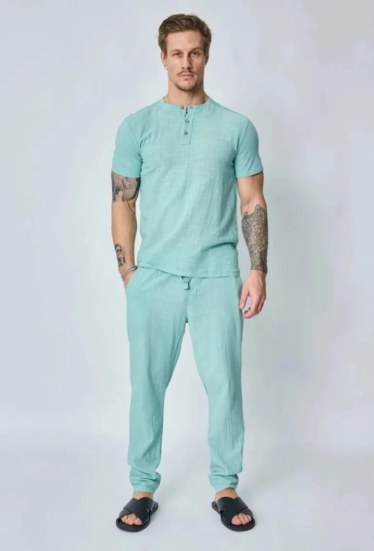 Ensemble polo pantalon uni effet lin