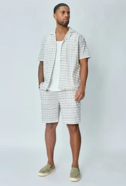 Ensemble short et chemise a motifs