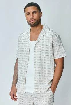 Ensemble short et chemise a motifs