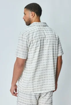 Ensemble short et chemise a motifs