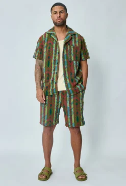 Ensemble short et chemise manche courte a motifs géométriques