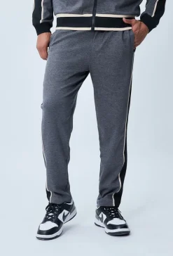 Ensemble sportwear veste et jogging à bandes latérales