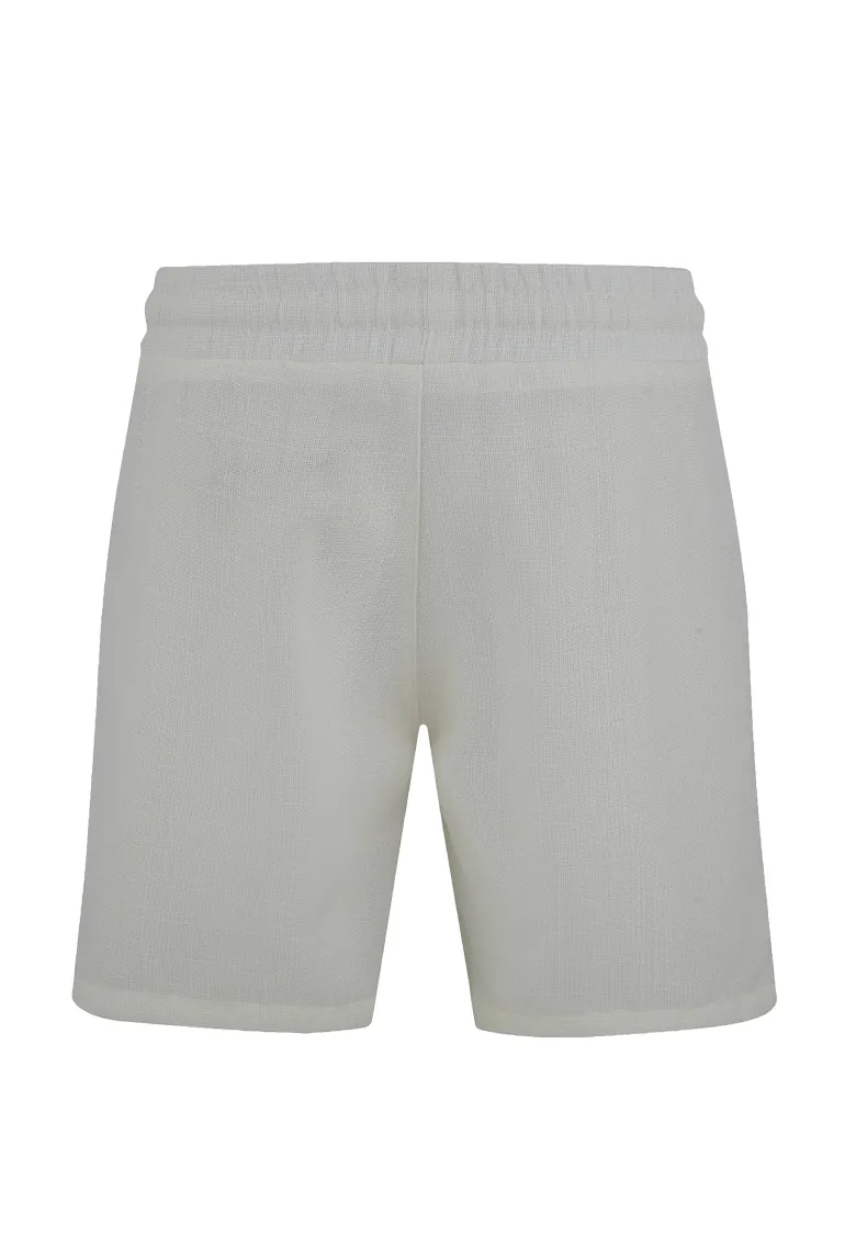 Ensemble uni chemise manches courtes short