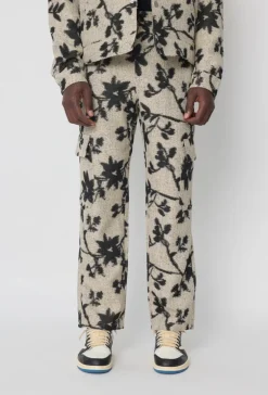 Ensemble veste pantalon à motif feuillage