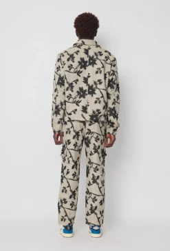 Ensemble veste pantalon à motif feuillage