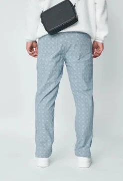 Jean large à motifs damier avec fentes