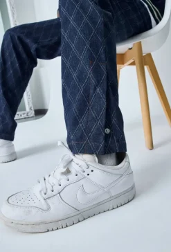 Jean large à motifs damier avec fentes
