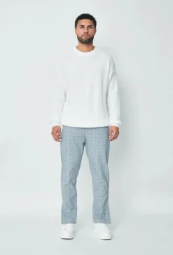 Jean large à motifs damier avec fentes