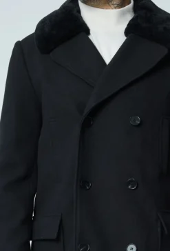 Manteau boutonné col à fourrure